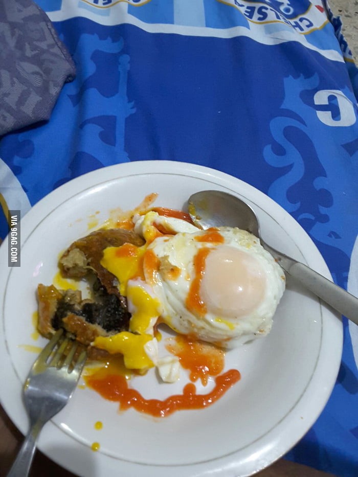 Fried chinese sesame seeds bun filled with diced pork and seaweed