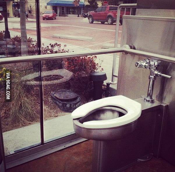 A public restroom with oneway glass. 9GAG