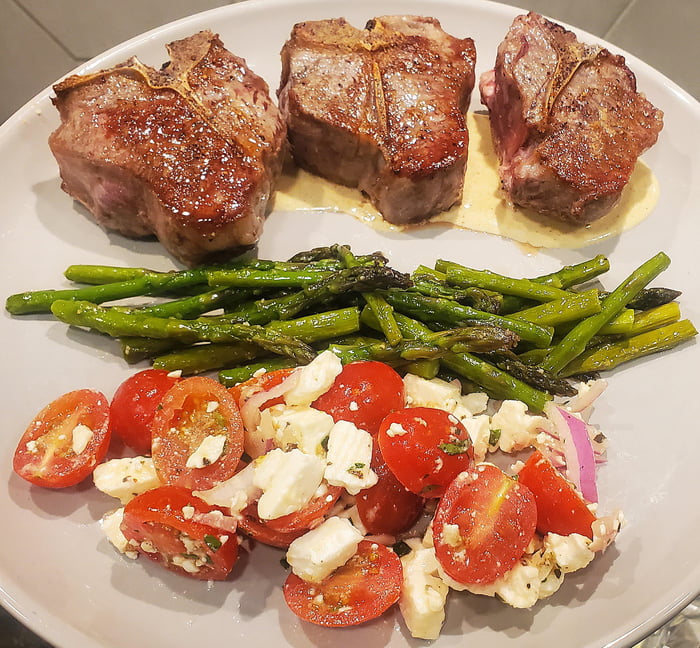 Lamb chops on a creamy mustard sauce, asparagus, tomato feta salad - 9GAG