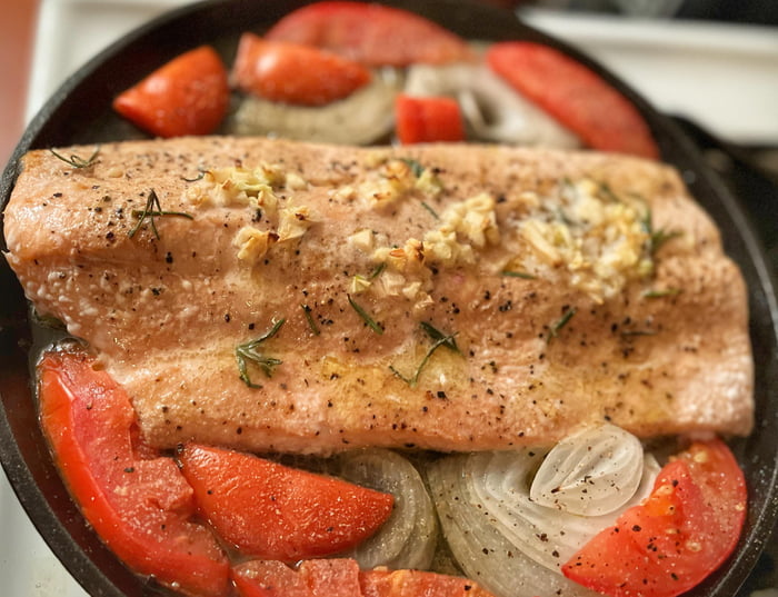 Wild Alaskan salmon roasted with garlic, herbs, white wine and white