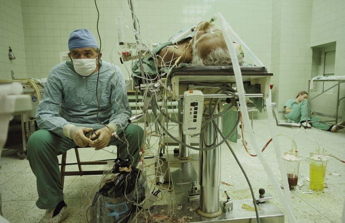 1987-dr-zbigniew-religa-monitors-his-patient-s-vitals-after-a-23-hour