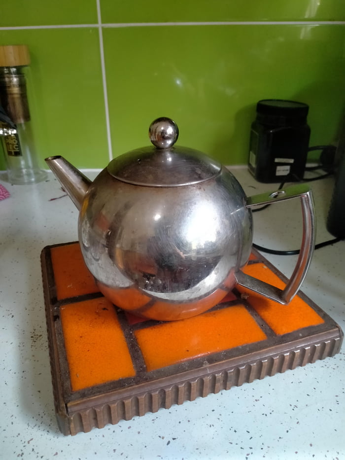 This metal teapot that gets extremely hot when tea is brewing even the