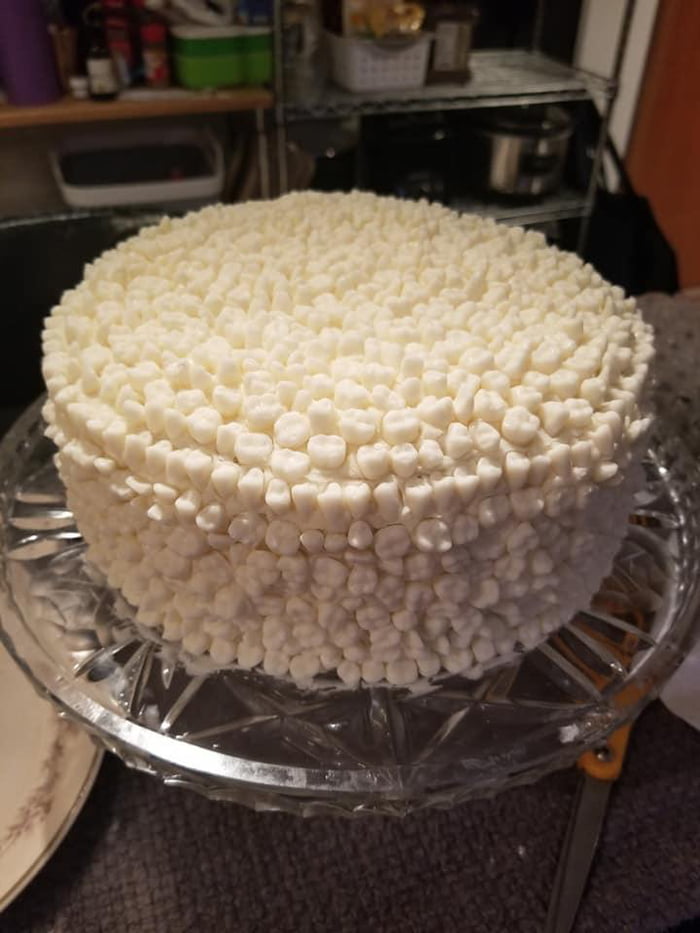 Just a cake covered in white chocolate teeth 9GAG