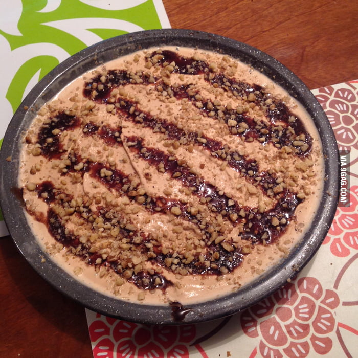 Coffee Ice Cream Pie With An Oreo Crust With Crushed Nuts And