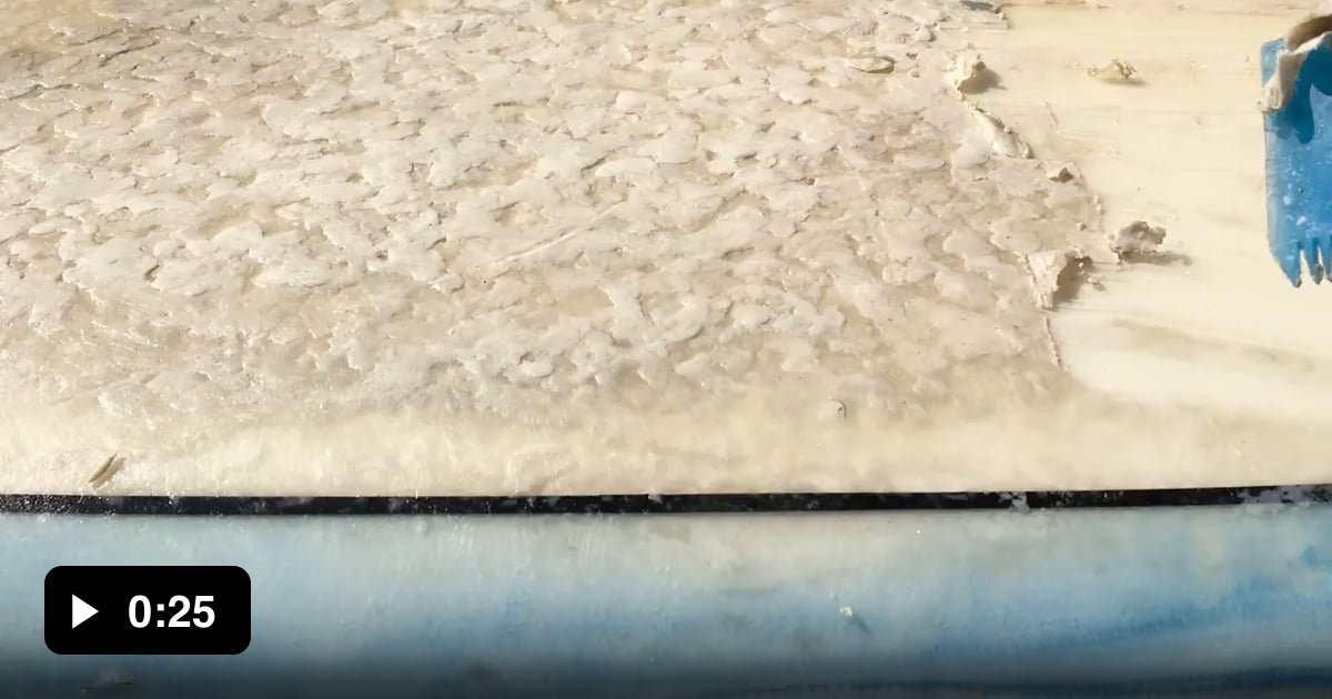 The proper way to remove wax from a surfboard. Put it in the sun for 5