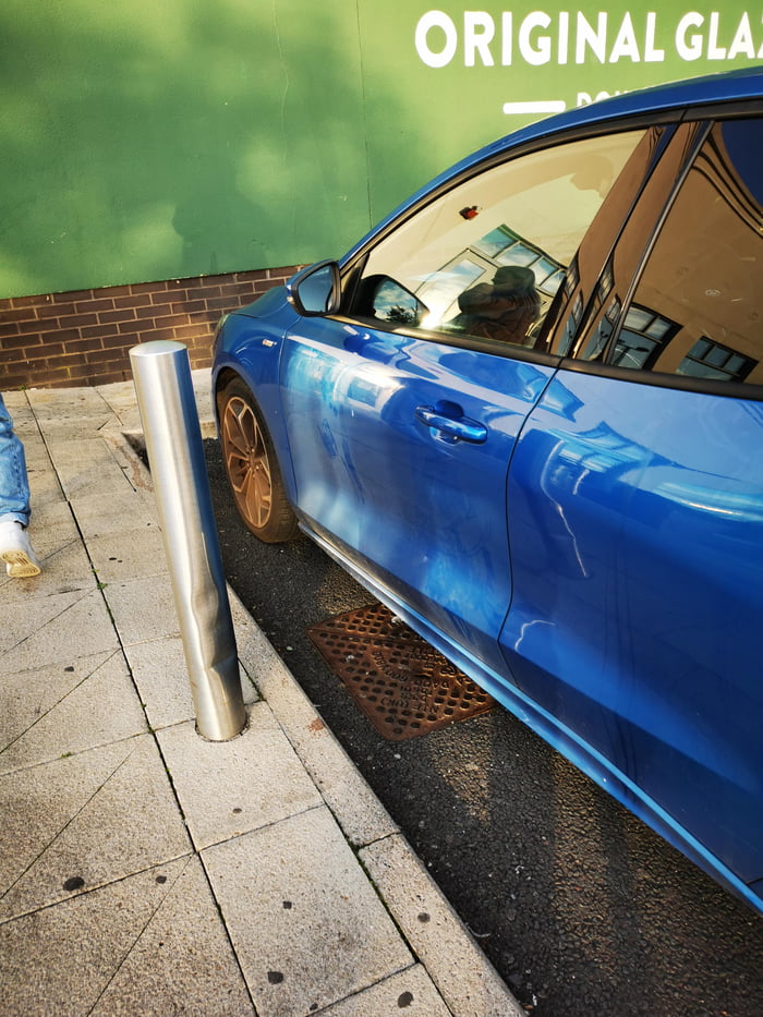 Putting a pole on one side of a disabled parking space so only one side