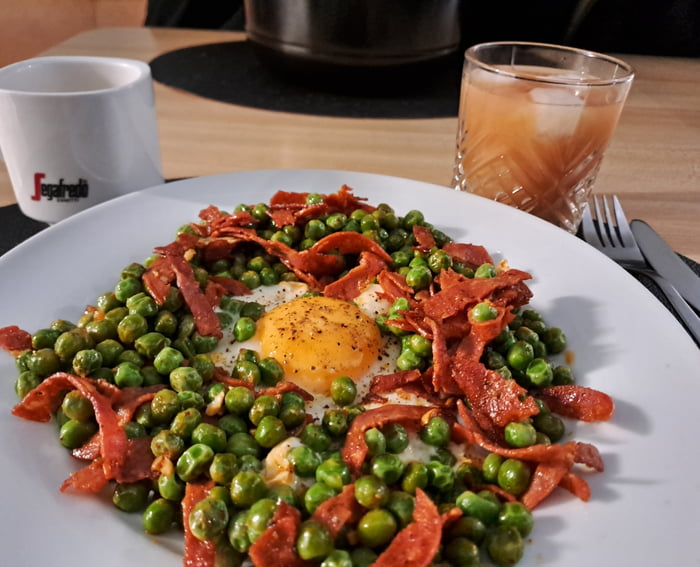 Hangover breakfast (chorizo, peas, egg, spices) ft. tequila sunrise and