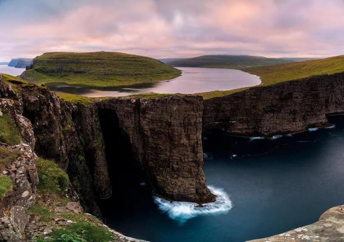 A Lake Above An Ocean Perched On Cliffs Above The Ocean Lake Sørvágsvatn In The Faroe Islands 