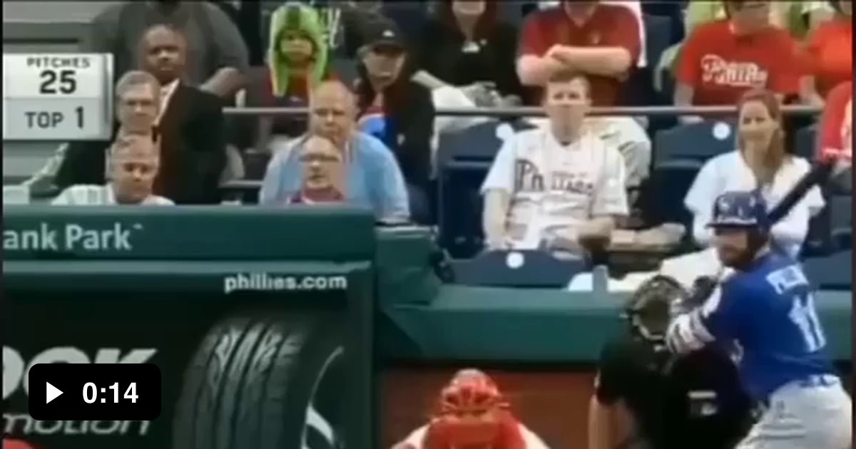 A man catches baseball ball while holding his daughter 9GAG