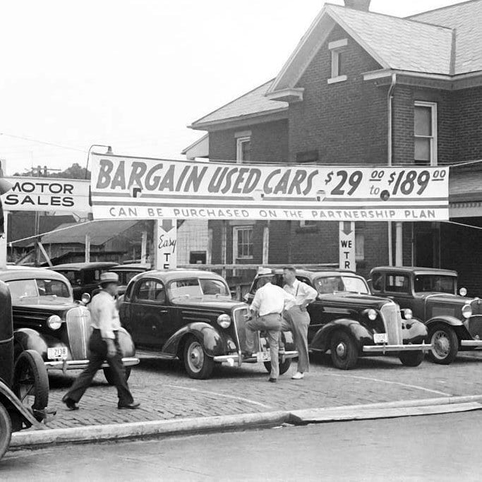 Used car lot, late 1930's. Those prices would be about 500 to 3300 in