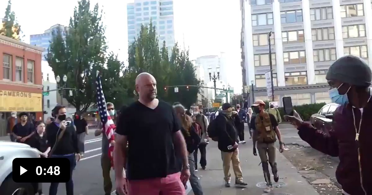 Women leaving Trump rally thrown to ground in an attempt to take flag ...