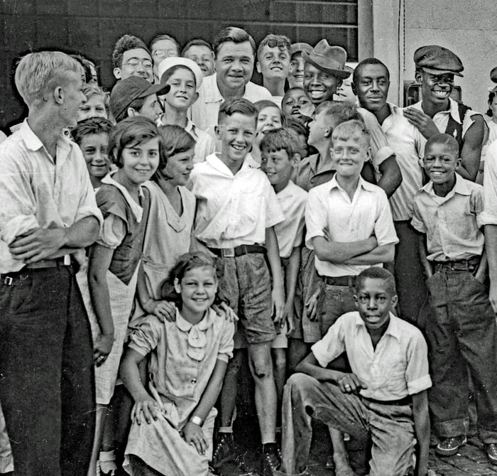 Babe Ruth with some young fans in Norfolk, VA, 1934 - 9GAG