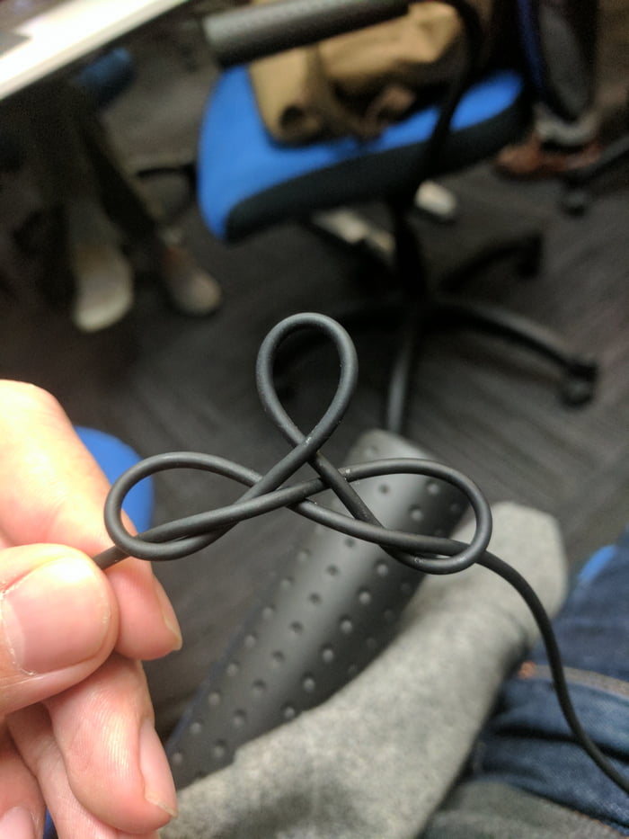My headphone cable tangled itself into a symmetrical knot. 9GAG