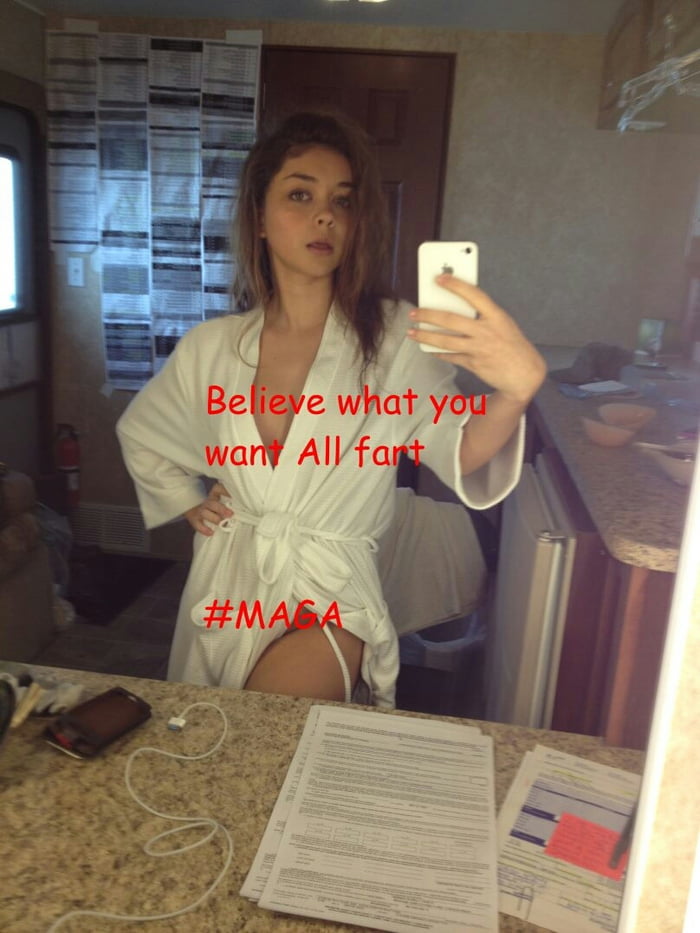 Sarah Hyland takes a selfie in just a robe.