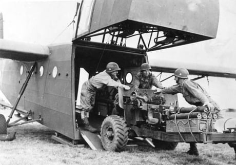 Paratroopers of the 82nd Airborne Division load an M1 57mm Anti ...