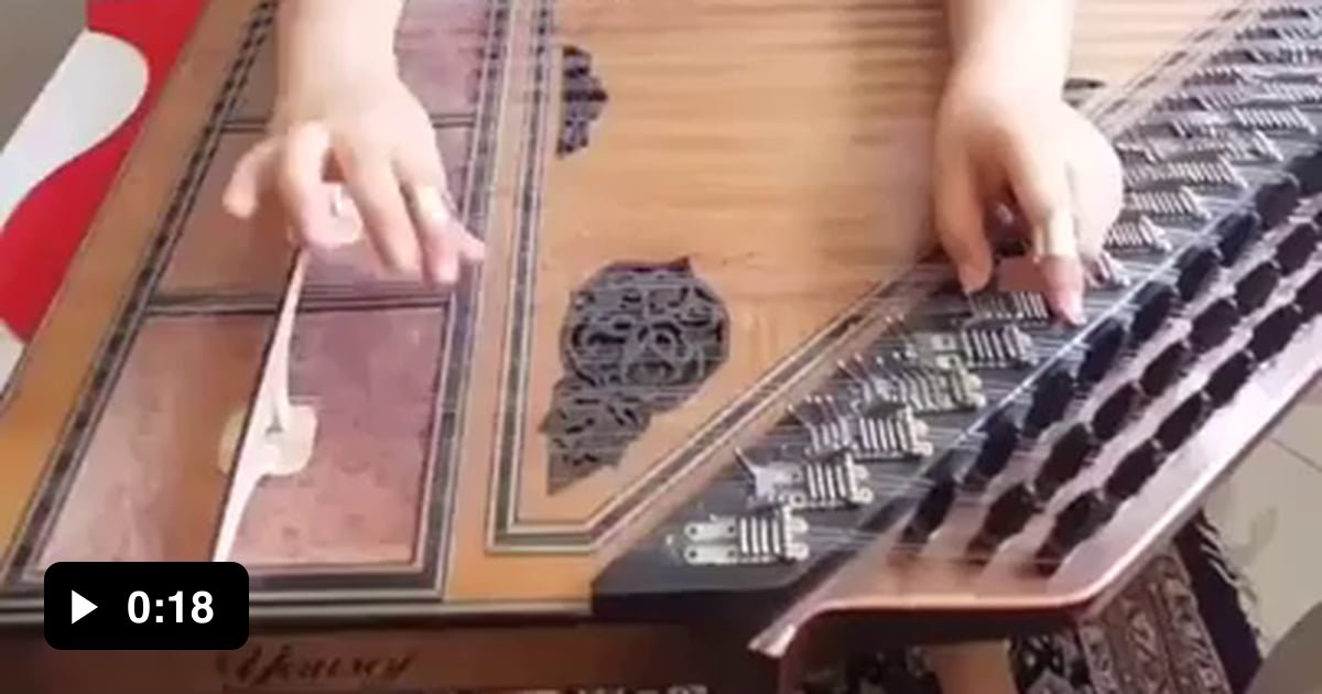 Kid jamming out on a kanun (Arabian zither) 9GAG