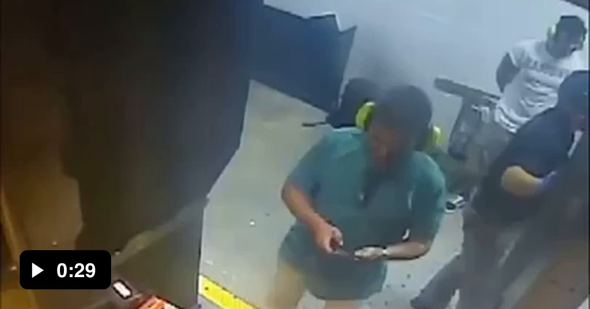 Guy points gun at buddies head for a picture 9GAG