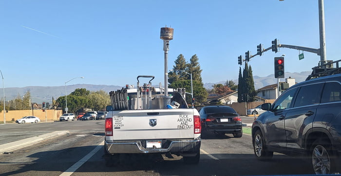 Truck in front of me driving slowly with unsecured load on the left ...