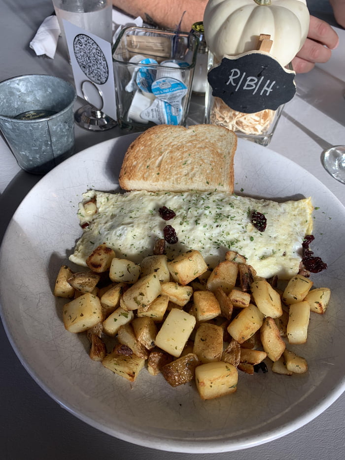 Egg white omelette with goat cheese, dried cherries, bacon from