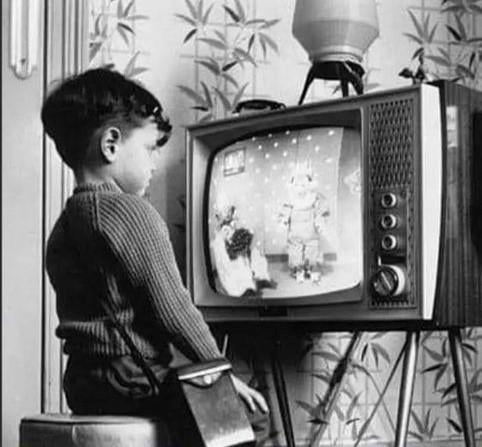 A kid potentially ruining his eyesight in the 1960's - 9GAG