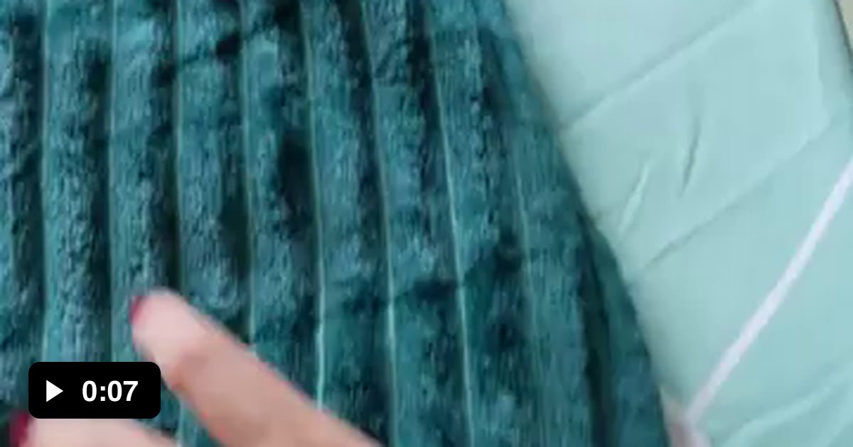 We got a blanket to stop the fluff on the bed. She wasn't happy being