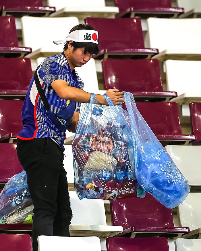 Even after a famous win at the World Cup, Japan fans stayed behind to ...