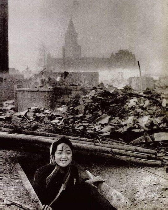 A young woman who survived the atomic bombing of Nagasaki , August 1945