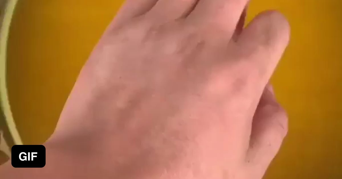 Dipping your hand in melted wax 9GAG