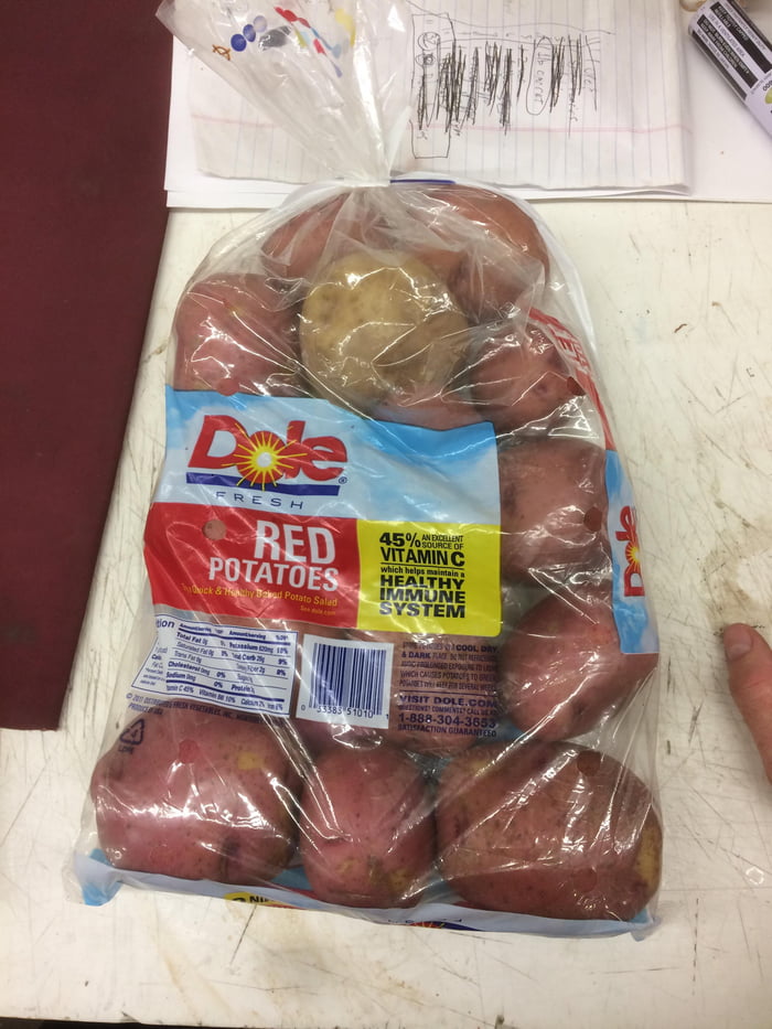 Bag Of Red Potatoes At Work That Has A Single Russet Potato In It Bag Of Red Potatoes At Work That Has A Single Russet Potato In It