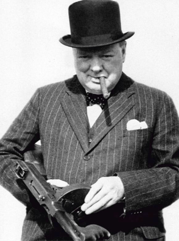 Sir Winston Churchill holding a Thompson Model 1928 during an ...