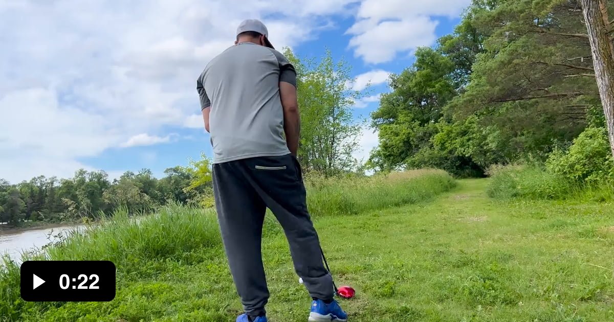 Hitting golf ball across river (with zero golf experience) 9GAG