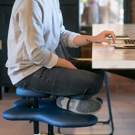 This Chair Is Designed To Let You Sit Cross Legged At The Office