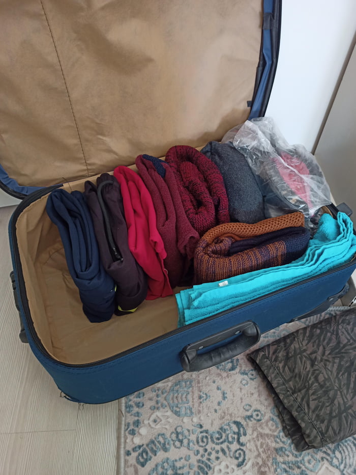 if-you-put-clothes-in-the-suitcase-vertically-instead-of-horizontally