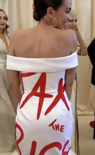 AOC Is At The Met Gala The Back Of Her Dress Reads TAX THE RICH 9GAG