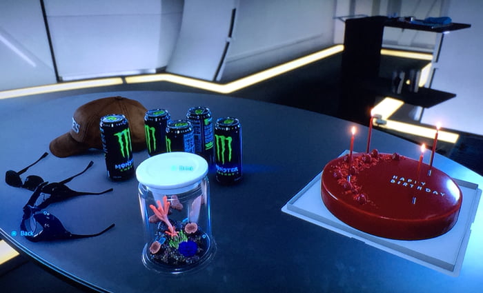 Death Stranding) It is my birthday and as you can see they've added a birthday cake on my desk. Here you can see a developer who puts their heart and soul in