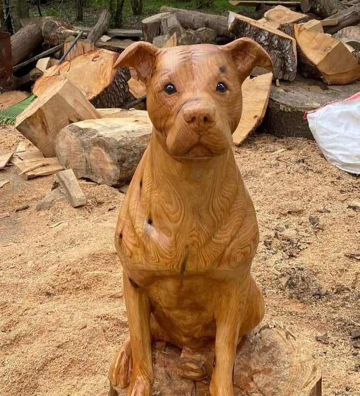 Wooden dog This artwork is by Michael Jones Man & His Dog Carvings