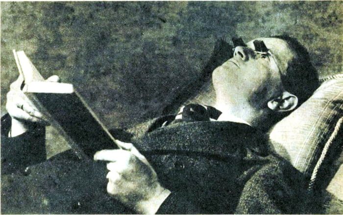 a-man-reading-with-the-hamblin-glasses-in-1937-invented-by-optician