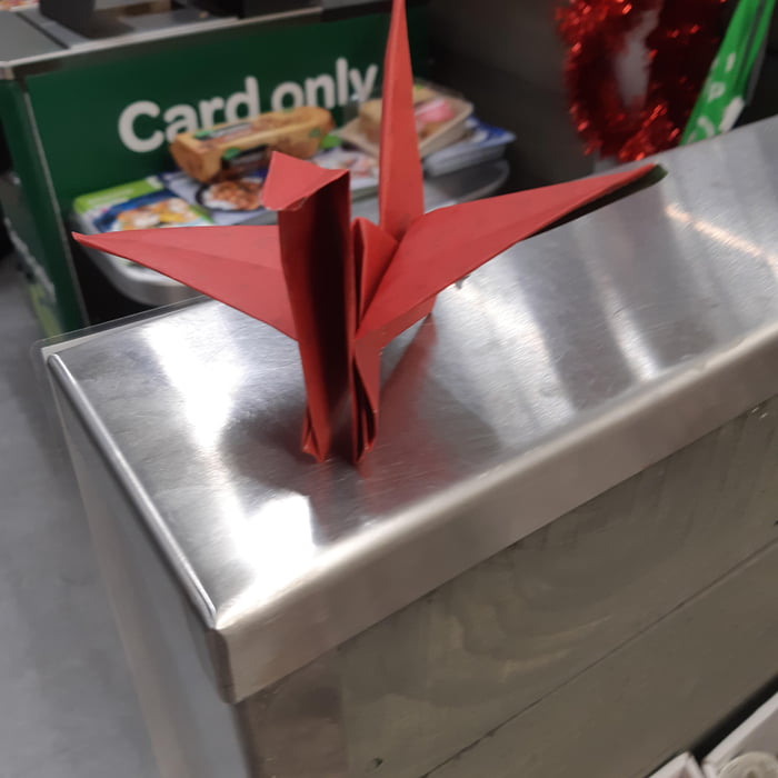 I've started to make paper cranes and place them around in public