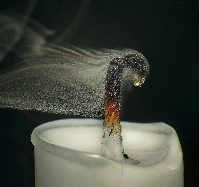 Highres closeup view of a smoldering candle wick 9GAG