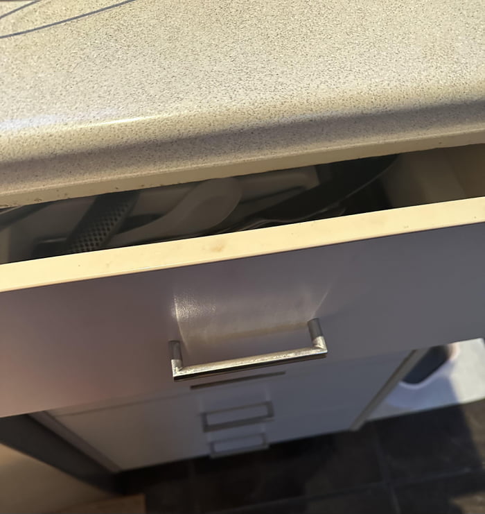 Knife is stuck in kitchen drawer now can’t open it, been trying for 2