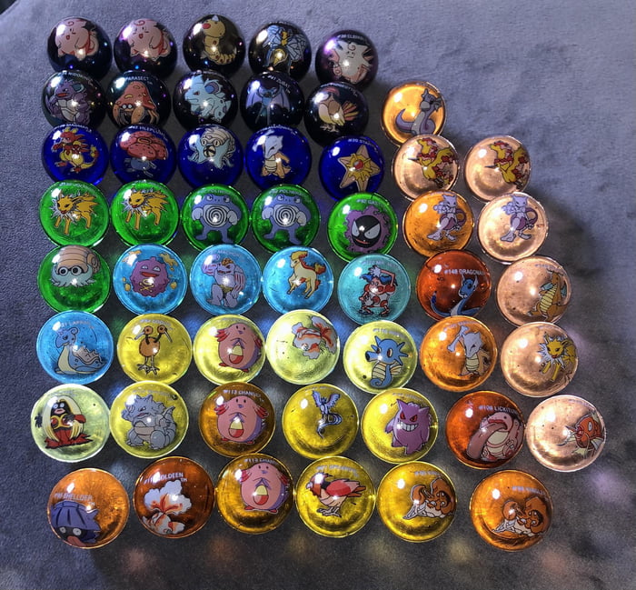 Found these Pokémon glass marbles in the basement and just wanted to