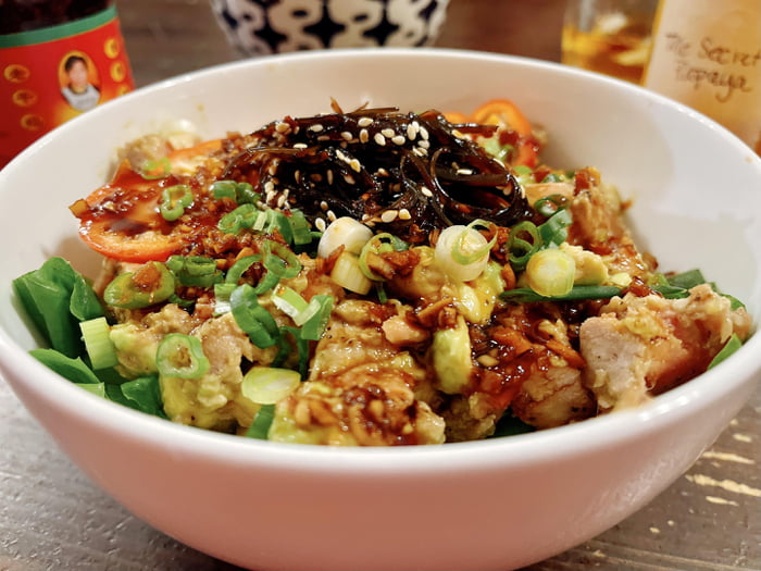 Tuna Tataki And Avocado Poke Bowl Over Rice And Arugula Topped With