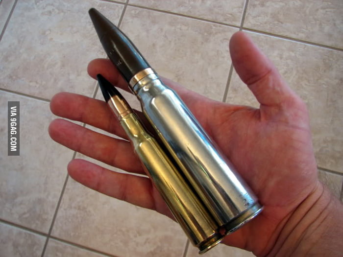The Small Bullet Is A 50 BMG The Larger One Is The 20MM Rifle Round 