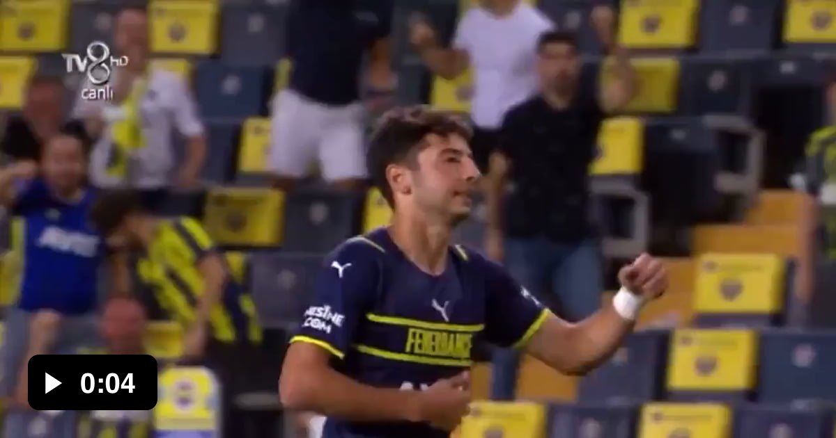 Muhammed Gumuskaya tries to celebrate by kissing the Fenerbahce badge ...