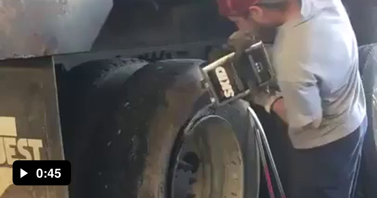 Changing a semi truck tire in under a minute. 9GAG