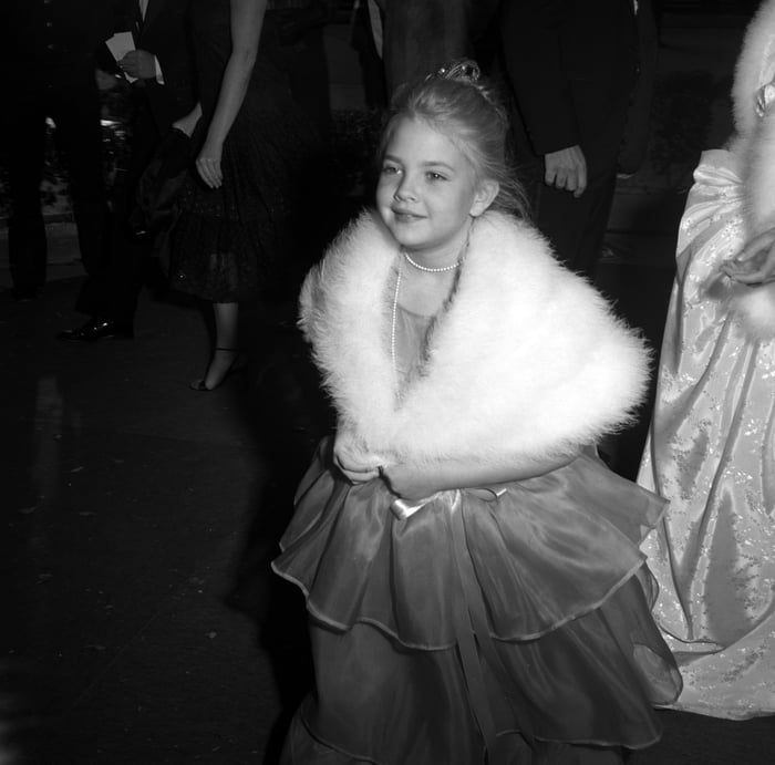 A young Drew Barrymore arriving at the Oscars in 1982. - 9GAG