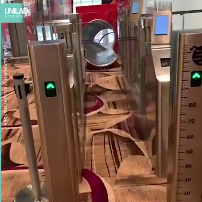 Airport in Singapore has a slide that will take you into the terminal