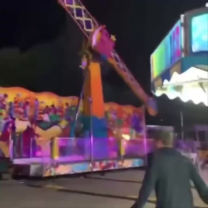 Bystanders at the Cherry Festival in Traverse City, Michigan rushed over to stop a carnival ride from tipping over