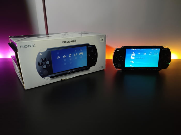 A brand new Sony PSP fresh out of the box and about to finally fulfill