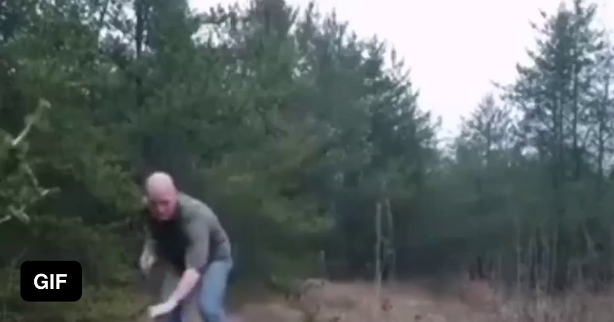 Man saves trapped wolf - 9GAG